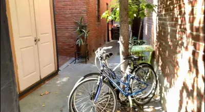 a blue bike parked next to a building at Convention close by 2BR Suite Free Parking in San Diego