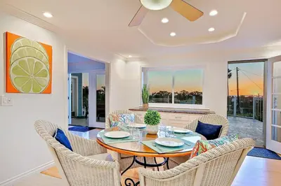 a dining room with a table and chairs at 1185 Tamarack home in Carlsbad