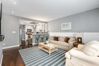 a living room with a couch and a table at 689 - Steps to the Resort, Peaceful Studio with free Wifi & Parking in Encinitas