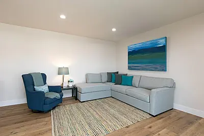 a living room with a couch and two chairs at 106B New Renovation! Huge Patio with Harbor View in Oceanside