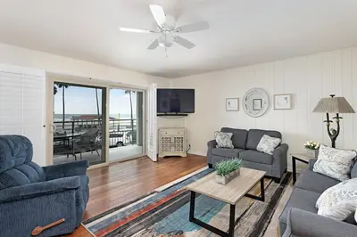 a living room with two couches and a tv at 212A Beachfront View-Free Wifi in Oceanside