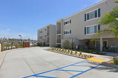 an empty sidewalk in front of a building at 214A - Beach and Water View, Steps to the Sand in Oceanside