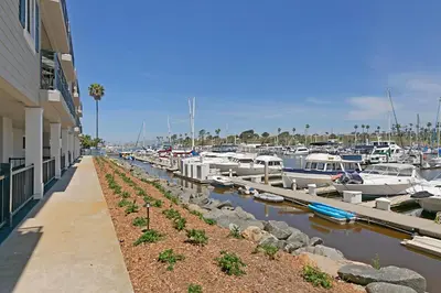 a bunch of boats docked in a marina at 214A - Beach and Water View, Steps to the Sand in Oceanside