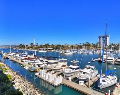 a bunch of boats docked in a marina at 305B - Seaside at the Marina - 100 Steps to the Sand in Oceanside