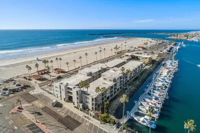 an aerial view of a marina and the beach at 305B - Seaside at the Marina - 100 Steps to the Sand in Oceanside