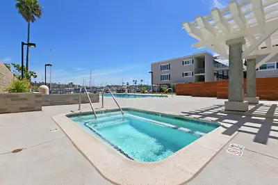 a swimming pool in the middle of a courtyard at 309A - Ocean and Beach View in Oceanside