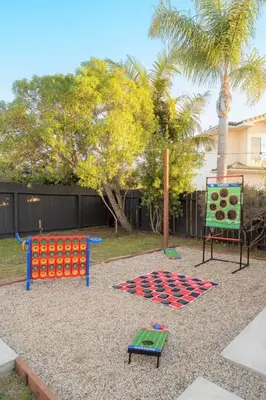 a playground with a ping pong table in a park at Entire house - 4 Bedroom & 2 Bath, 5 Min to Beach in Oceanside