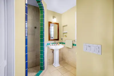 a bathroom with a sink and a shower at Spanish Style Cozy Studio in San Diego