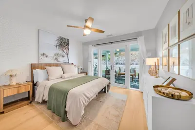 a bedroom with a bed and a ceiling fan at Colorful & Comfy Gem Close to Beach - Yard - Pkg in Encinitas