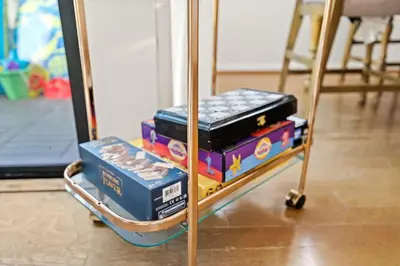 a cart full of play items on a table at Grand Desire - Vibrant - Luxury - Beachside treat in San Diego