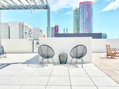 a couple of chairs sitting on top of a roof at The Executive Getaway in San Diego