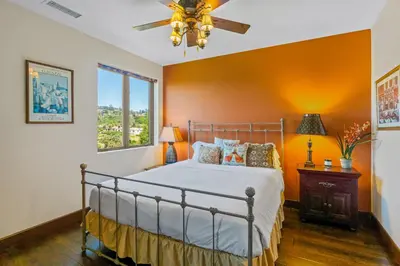 a bedroom with a bed and a window at Casa Real | House in La Jolla in San Diego