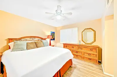 a bedroom with a bed and a ceiling fan at Newport Beach Simplicity III in Newport Beach