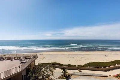 a view of a beach and the ocean at SB-767D - Soothing Solana Oceanfront Condo in Solana Beach