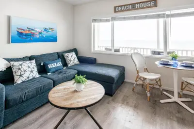 a living room with a couch and a table at CB-2445C - Carlsbad Casa De Los Sueños | Unit C in Carlsbad