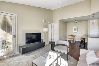 a living room with a couch and a table at La Jolla 1br w gym wd pool nr bars shops SAN-8 in San Diego