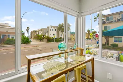 a room with a window with a view of a street at Beach-2-Bay 2br - Beach - AC - Patio in San Diego