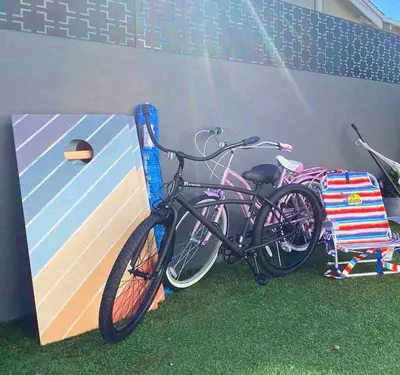 a bike is parked next to a wall at Crown Point Home w/ Cowboy Pool 2 Blocks to Bay in San Diego