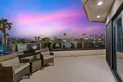 a living room with a view of a city at Pacific Beach Paradise by Cardo -Spacious Retreat in San Diego