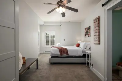 a bedroom with a bed and a ceiling fan at South Park Charmer - Close to Zoo - Backyard Oasis in San Diego
