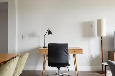 a black chair sitting at a desk with a lamp at Carmel Valley 2br w gym bbq wd nr dining SAN-28 in San Diego