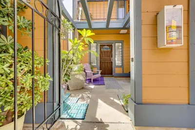 an entrance to a house with a glass door at Carlsbad Rental with Private Balcony and Pool Access! in Carlsbad