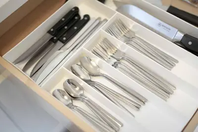 a drawer with silver utensils in a box at Beachside Bliss 2BR with Fast WiFi in San Diego