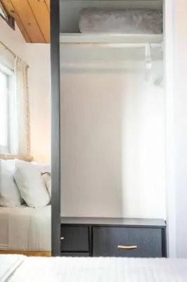 a bedroom with a bed and a mirror in a room at Remodeled Boho 2 Bed Near Zoo and Downtown in San Diego