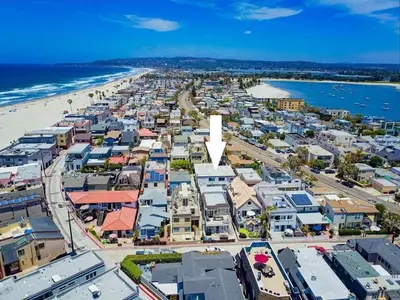 an aerial view of a beach with houses and condos at Avalon Beach 3 in San Diego