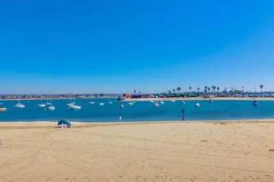 a view of a beach with boats in the water at Bayside 4 in San Diego