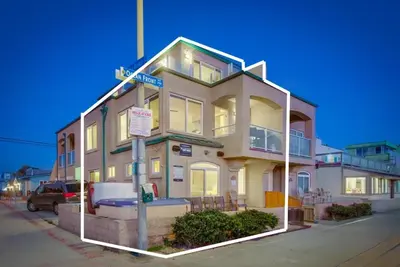 a building with a street sign in front of it at Beach Break 2 in San Diego