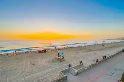 a view of a beach with people and the ocean at Beach Break 2 in San Diego