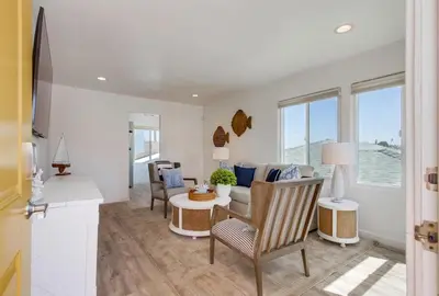 a living room with a couch and a table at Boardwalk 2 in San Diego