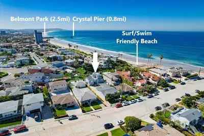 an aerial view of a city with the beach at Pacific Shores in San Diego