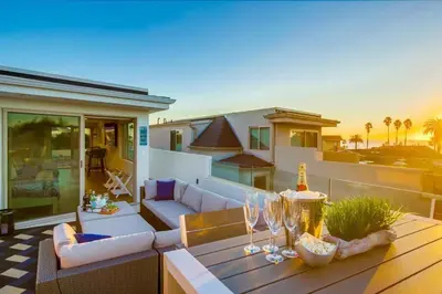 a living room with a couch and a table at CA Dreaming in San Diego