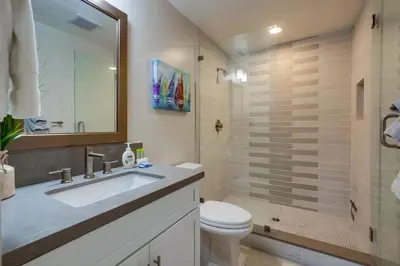 a bathroom with a sink and a toilet and a shower at CA Dreaming in San Diego