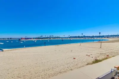 a view of a beach with boats in the water at Bayside 2 in San Diego