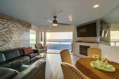 a living room with a couch and a table at Beachside 4 in San Diego