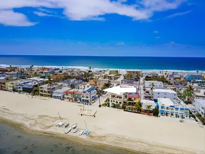 an aerial view of a beach with boats on the sand at Marina 1 in San Diego