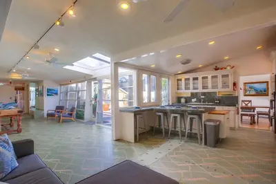 a kitchen and living room with an open floor plan at Treasure Villa in San Diego