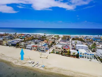 an aerial view of a beach with a town at Waterfront 4 in San Diego
