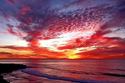 a sunset over the ocean with the sky at Waterfront 4 in San Diego