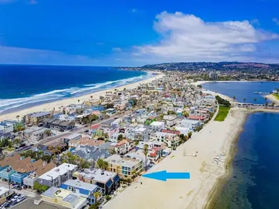an aerial view of a beach with a blue arrow at Waterfront 4 in San Diego