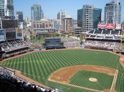 a baseball field with a crowd watching a baseball game at 28 NIGHT MINIMUM in the Gaslamp Quarter by Petco Park, pool, jacuzzi, dogs ok in San Diego