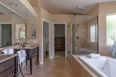 a large bathroom with a tub and a shower at Escape to Carmel Valley Tranquil Outdoor Space in San Diego