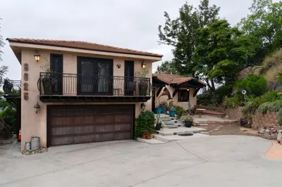 a house with a garage and a driveway at Stunning Home & Spectacular View in La Mesa