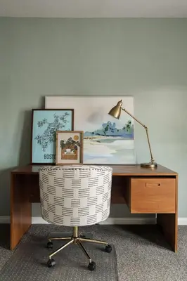 a desk with a chair and a lamp on it at Victorian Retreat in Barrio Logan 1mi to Downtown in San Diego