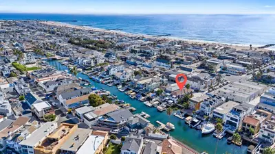 an aerial view of a city with boats in a harbor at Stunning BayVIEW Home with Epic Waterfront Views! in Newport Beach