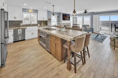 a kitchen with a island in the middle of a room at Seaview 1135A in Oceanside