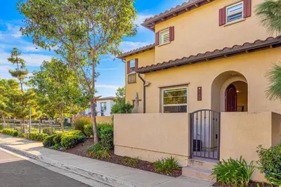 a house with a gate on a street at Leucadia Stonesteps Retreat in Encinitas